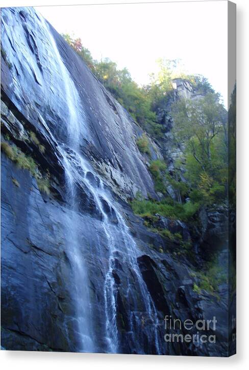 Cascading Waterfall on Rocky Cliffside - Canvas Print