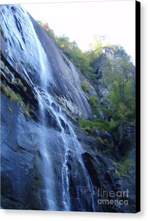 Cascading Waterfall on Rocky Cliffside - Canvas Print