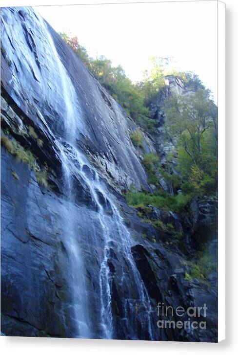 Cascading Waterfall on Rocky Cliffside - Canvas Print