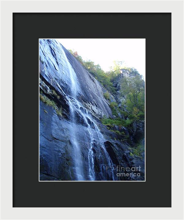 Cascading Waterfall on Rocky Cliffside - Framed Print