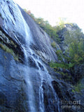 Cascading Waterfall on Rocky Cliffside - Puzzle