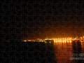 City Harbor Illuminated at Night - Puzzle