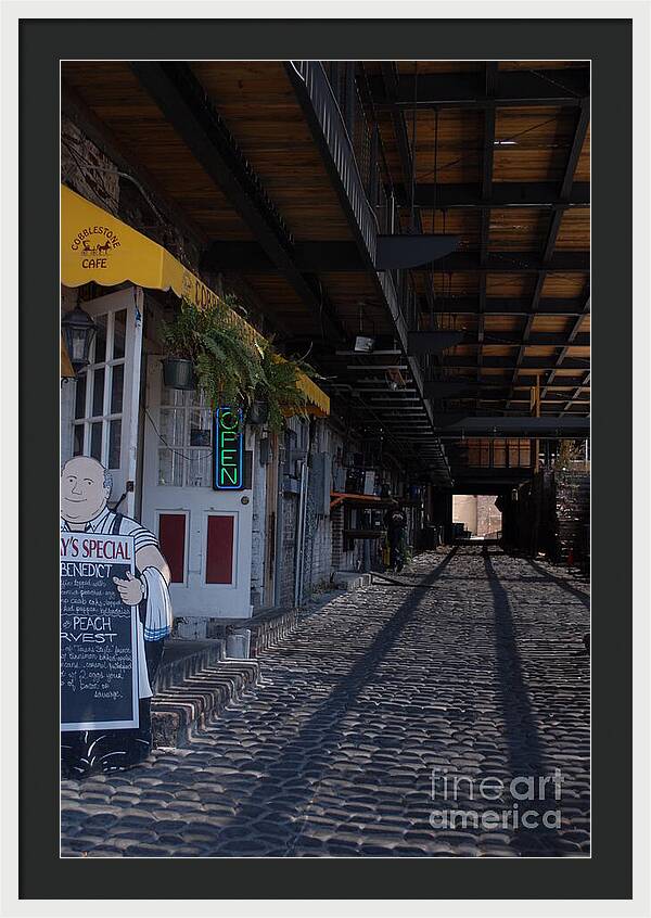 Cobblestone Cafe Exterior in Alley - Framed Print