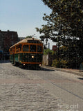Historic Streetcar on Cobblestone Street Jigsaw Puzzle by Independent Artist