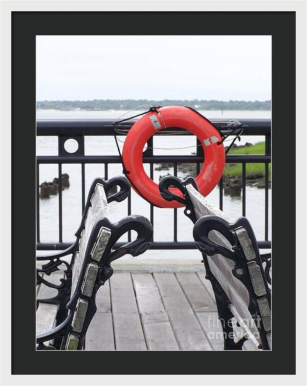Lifebuoy Overlooking a Calm River - Framed Print