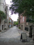 Quiet Cobblestone Street in City - Puzzle